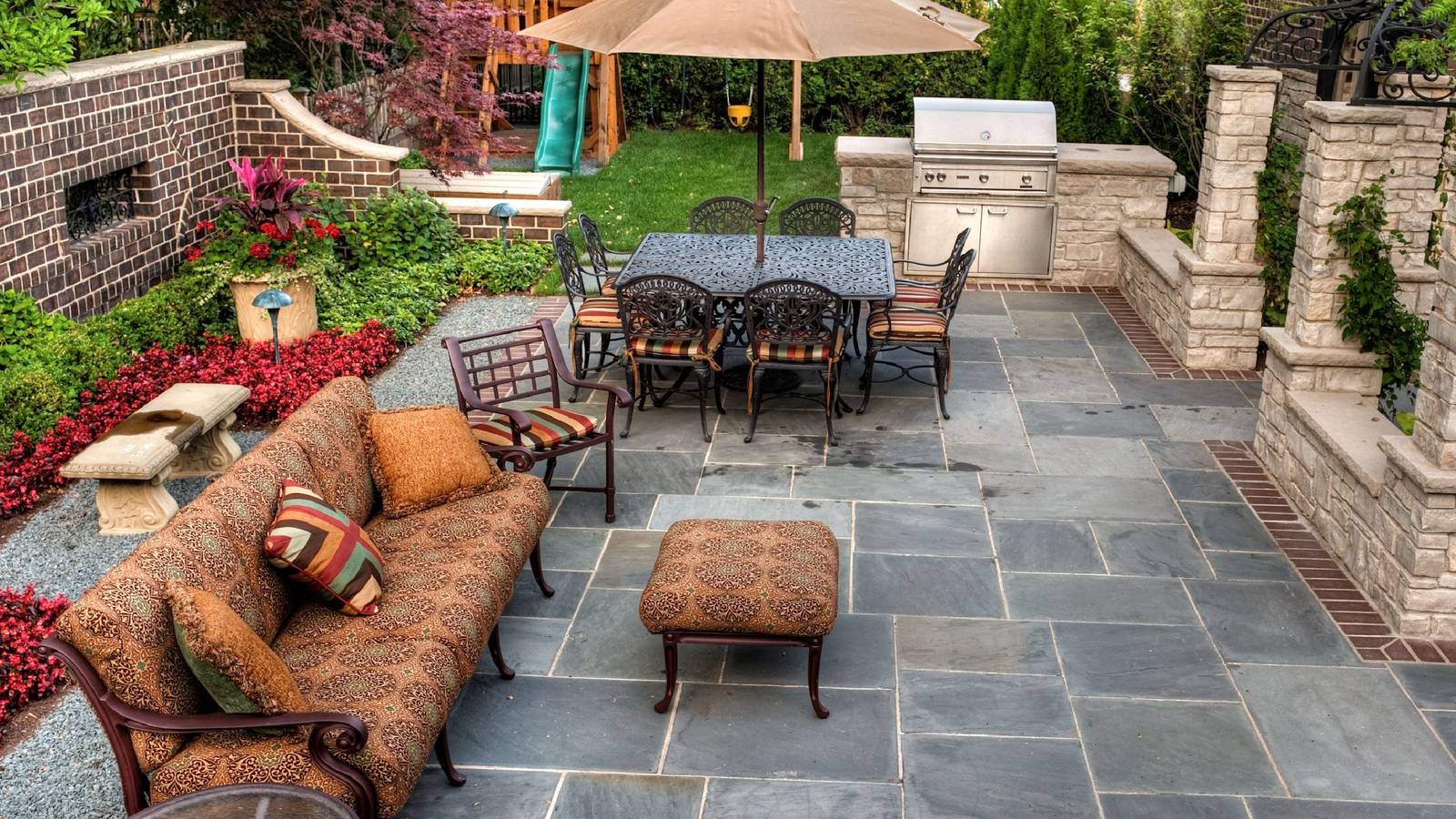 Beautiful patio with outdoor furniture and greenery