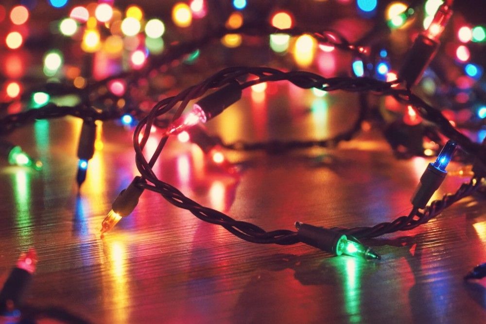 How to Hang Outdoor String Lights to Illuminate Your Backyard Oasis