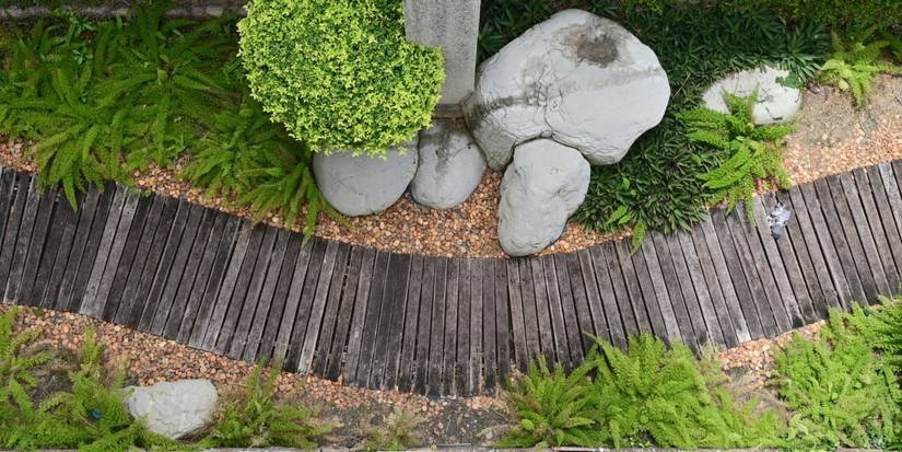 Build a Show-Stopping Garden Path Using Wooden Planks