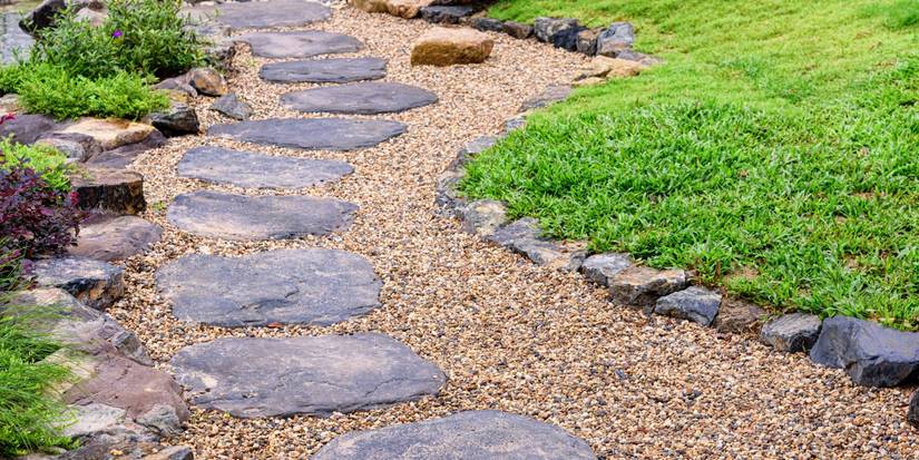 Transform Your Yard With a Stylish Garden Pathway of Contrasting Rocks