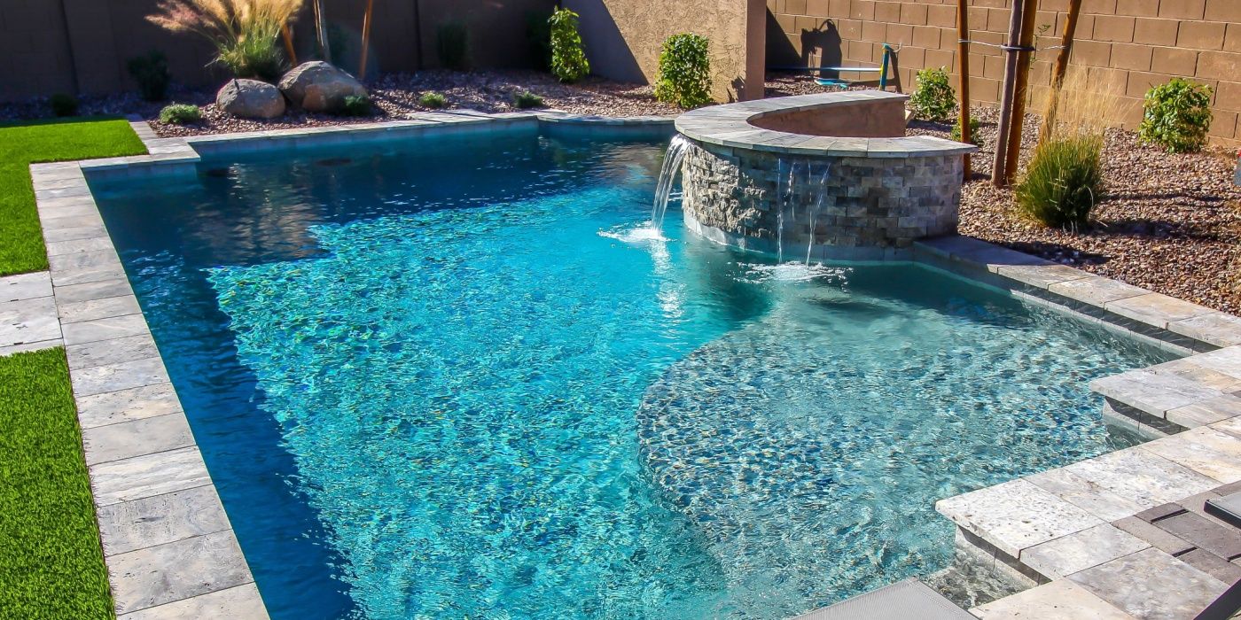 How to Design the Perfect Pool and Waterfall for Any Backyard