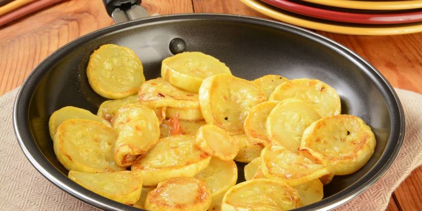 Summer yellow squash in a frying pan