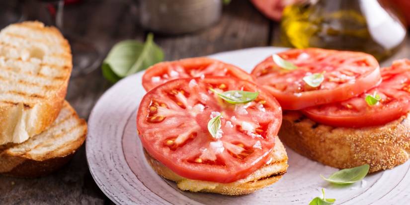 Tomato toast with fresh basil 