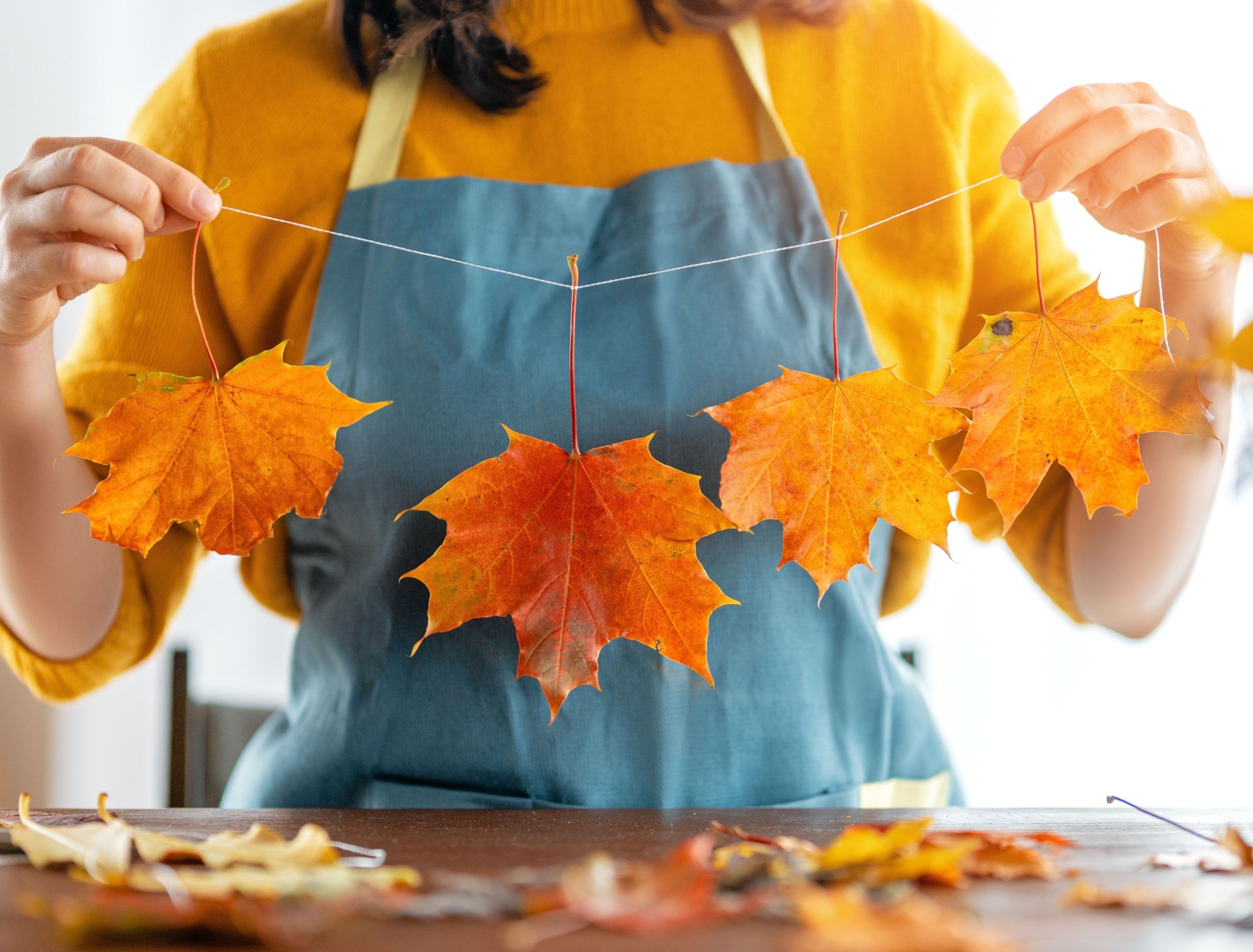 woman-hand-crafting-an-autumn-